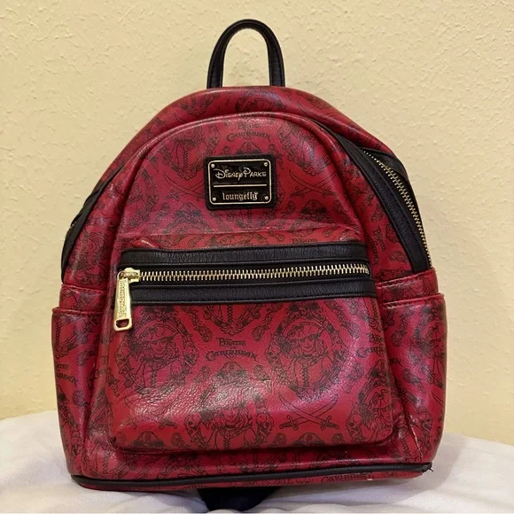 Disney Parks Loungefly Pirates of the Caribbean red and black mini backpack. Disney Parks Loungefly Pirates of the Caribbean Red Mini  main image 2